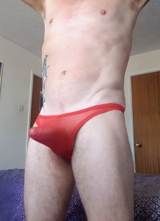 Morning wood in red thong