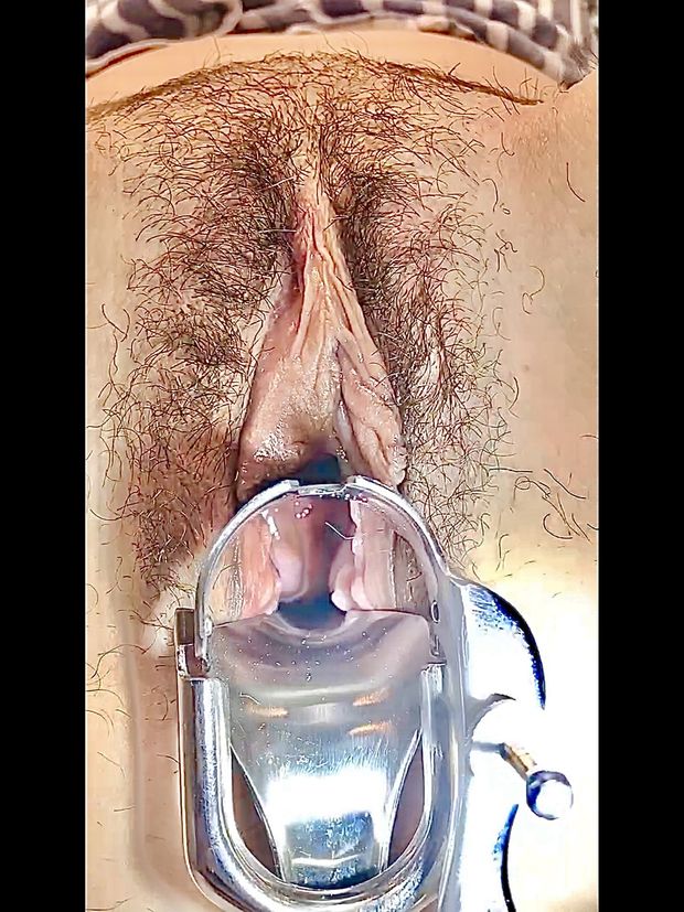 Abby with speculum opening her puss