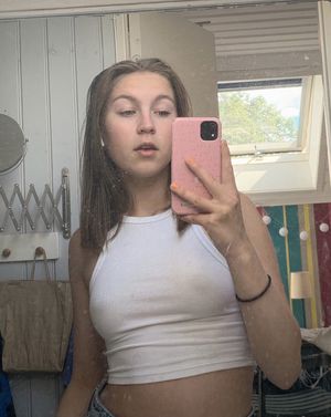 Brunette in see-through top