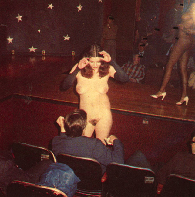 I believe this is Jill Munroe at one of the really sleazy Manhattan theaters about to have sex with an audience member
