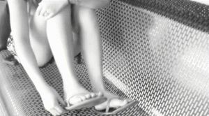 She Removes Her Flip Flops