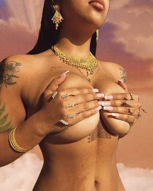 Handbra with tattoos & jewelry