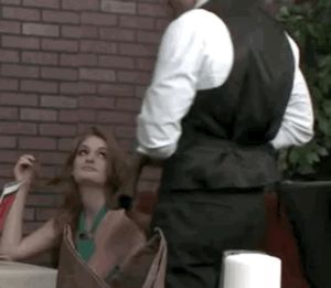 Waiter shocks a redhead