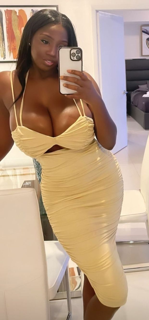Ellie Mae full body shot yellow/cream dress