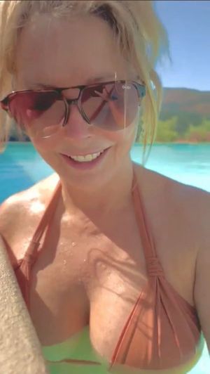 Carol huge boobs bikini