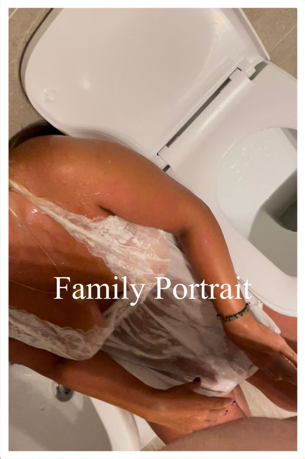 Stupid pisswhore on her knees, lined up for duty with her new friends.