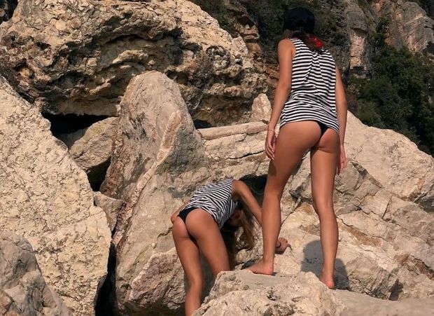 Two babes climbing