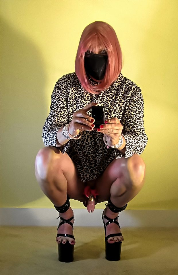 Dangling Sissy Clitty in Chastity.
