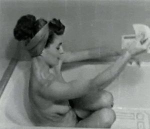 A vintage cutie lets us watch whlle she lathers up