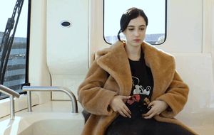 Showing her boobs on the train