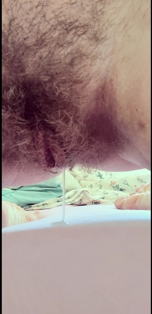 Dripping hairy pussy