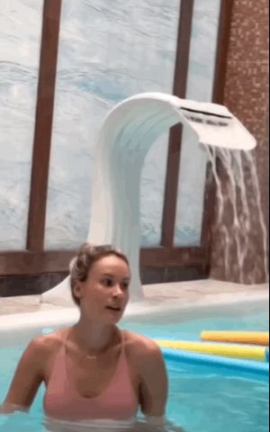 Stunning hot babe stepping out of the pool