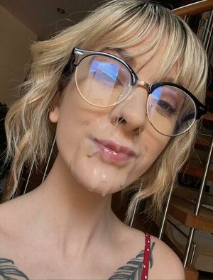 Jizz on her face and glasses