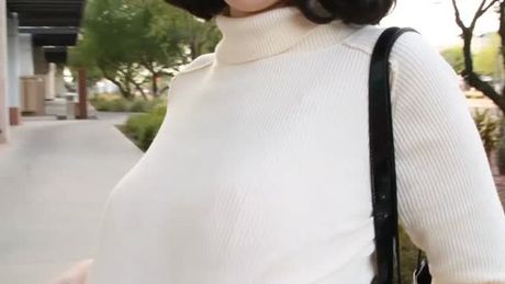 She lost a bet on who would get the higher grade on a test...so the tits came out in front of the library