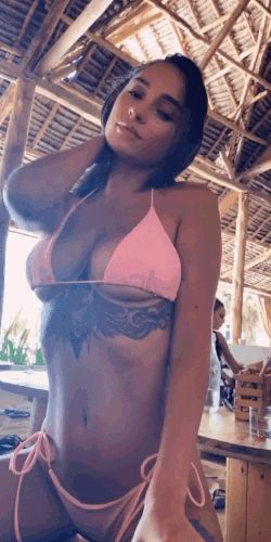 Liya showing off in a tiny pink bikini for you!