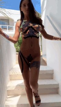 Damn, can she enter a room or what?!