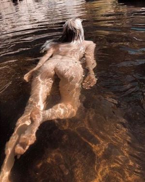 Skinny-dipping in a rocky pool...