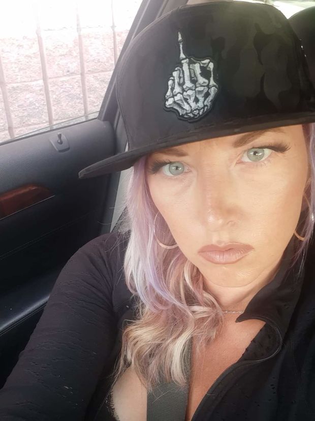 Pam purple hair and ball cap