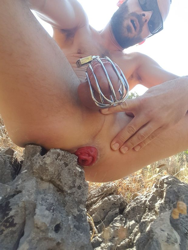 He wears a chastity cage but his hot wide open cunt is available for use.