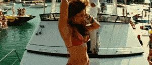 PIRANHA 3D - DANNI SEXY DANCING ON BOAT IN REVERSE GIF!