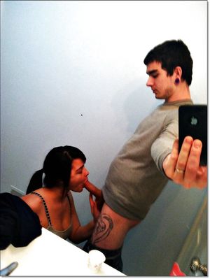 Mirror-shot brunette amateur in the bathroom sucking some dick