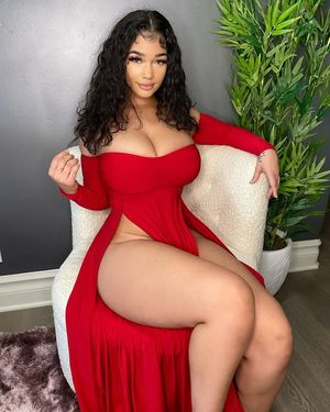 Lexie red dress sitting down