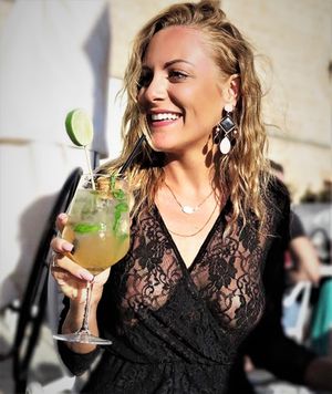 I love posting pictures of mature women enjoying life! Here we have middle aged woman enjoying a drink potographed by her teen son!