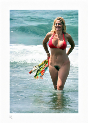 Milly steps out of the sea ! Milly has a surprise, she has taken off her swim trunks and is showing her soaking wet pussy