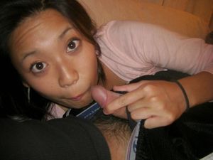 Cute Asian amateur giving some head with a silly face