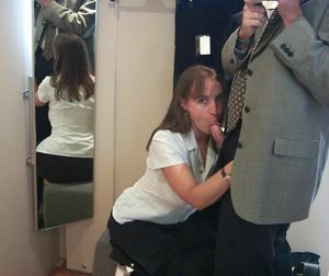 Brunette milf in a mirror-shot sucking on some cock