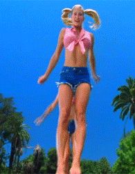 Twins jumping on trampolines