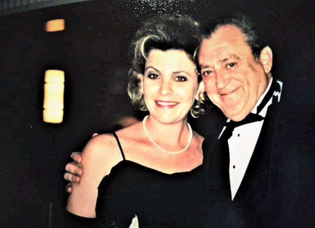 Karyn standing next to her Dad who loved and hated her because she was such a pain in the ass!