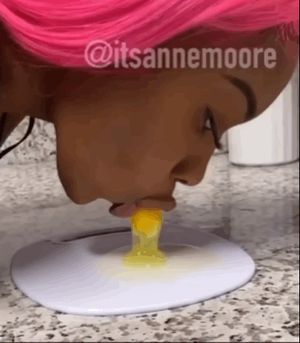Ebony sucking egg