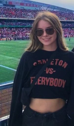 Bella sunglasses in stadium