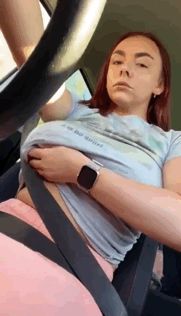 Exposing tits while driving.