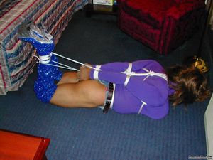 Transvestite in Thigh Boots Abandoned in Hogtie Bondage in a Hotel Room