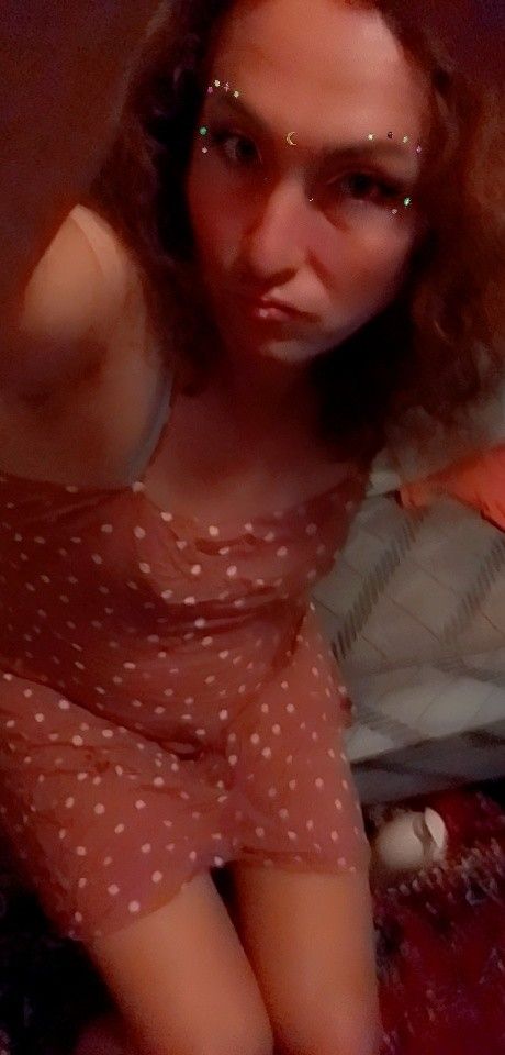 Brunette in polka dot dress