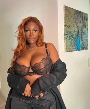 Shani Jamilah looking sexy in her Black bra