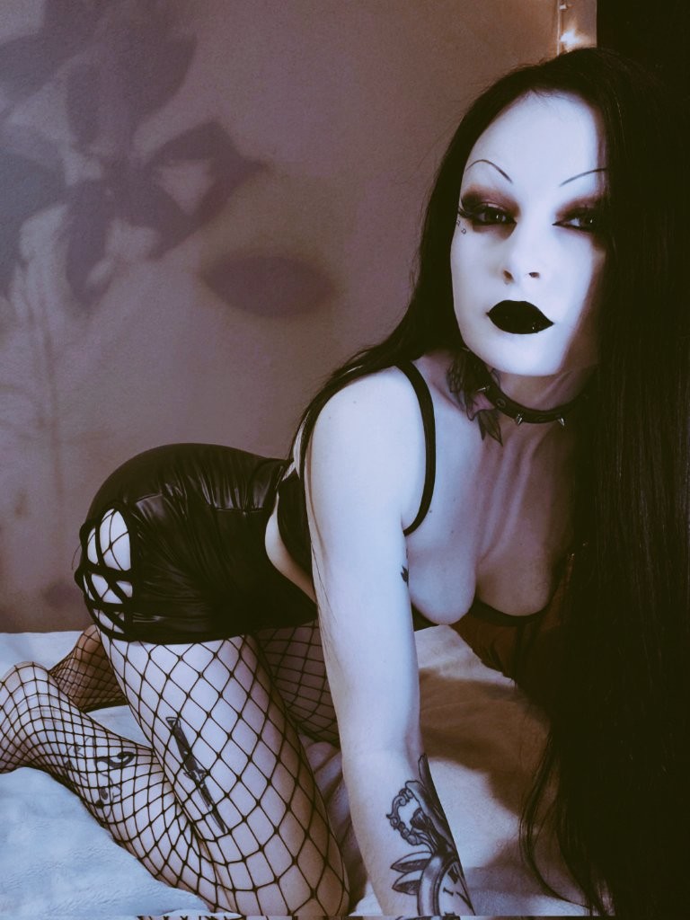 Beautiful goth on all fours