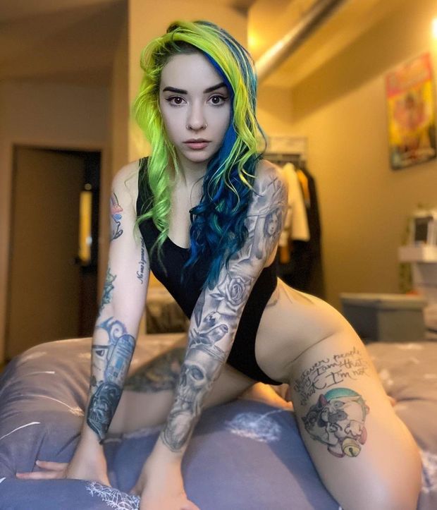 Tattooed beauty on your bed