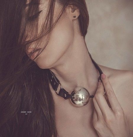 Love the "ball gag as fashion accessory" look.