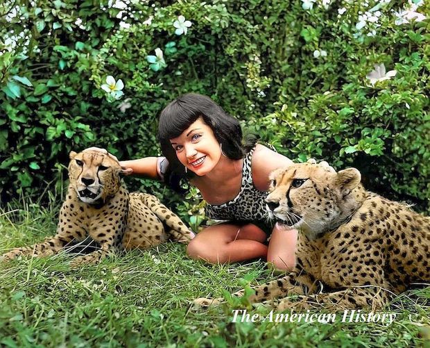 Bettie Page with leopards