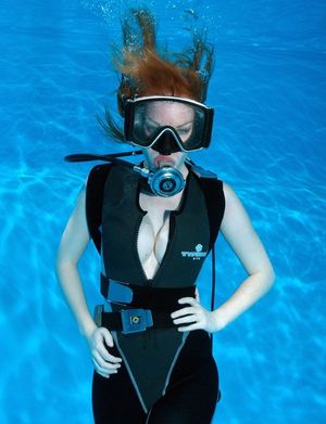 Big tits hiding in a wetsuit