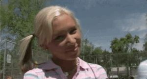 Cute pigtailed teen in the park