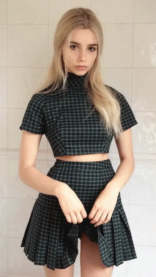 After waiting for everyone to leave the house, she secretly took out her mother's black dildo and decided to explore it with all her holes