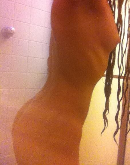 Showing off in the shower!! Isn't she a goddess??? What do you want to do to her??