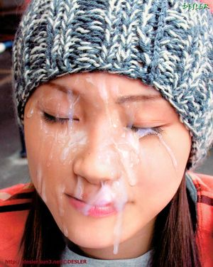 Cute woman covered in cum