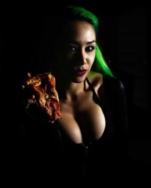 Shotzi Blackheart and a piece of pizza