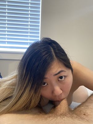 Asian amateur with a mouthful of cock