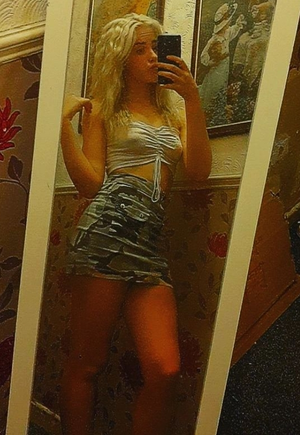 Sexy british woman wearing see through top